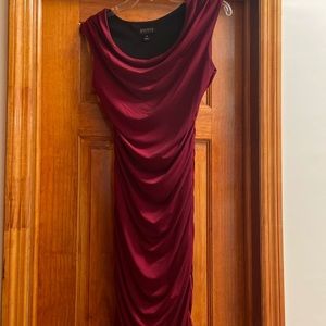 Deep red dress hugs curves